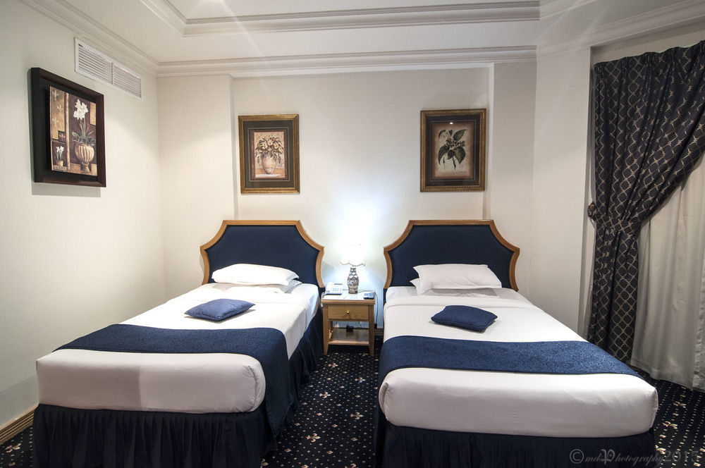 Cayam Hotel Doha Buitenkant foto